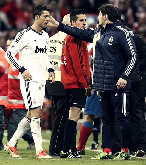 Cristiano Ronaldo being comforted by Iker Casillas, as he leaves the pitch after being sent off in Real Madrid 1-2 Atletico Madrid, for the Copa del Rey final 2013
