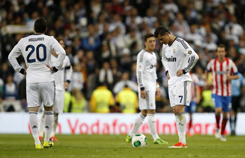 Cristiano Ronaldo looks down and prepares himself to take a free-kick for Real Madrid in the match against Atletico Madrid, in May 2013