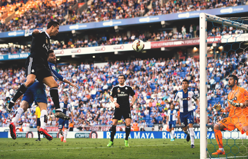 Cristiano Ronaldo jumps high in the air to score another header for Real Madrid