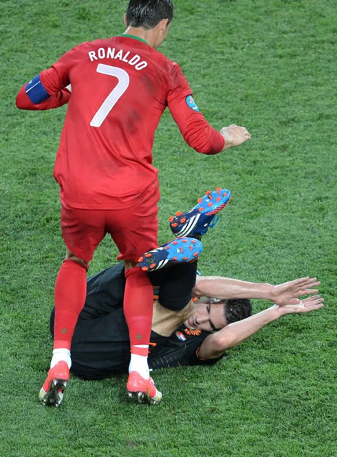 Cristiano Ronaldo trying not step into Robin Van Persie, in Portugal 2-1 Holland, at the EURO 2012