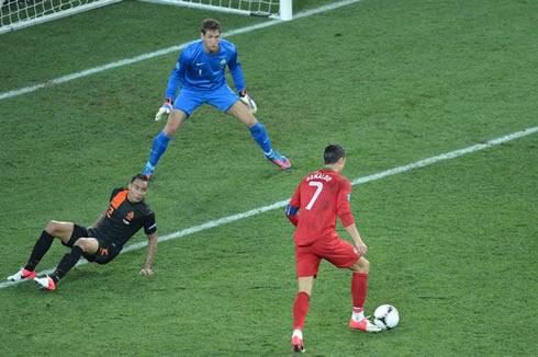 Cristiano Ronaldo sitting a Dutch defender and beating Stekelenburg, in Portugal 2-1 Holland, for the EURO 2012