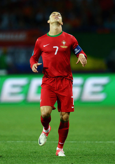 Cristiano Ronaldo closing his eyes and putting his head back, in Portugal vs Holland for the EURO 2012