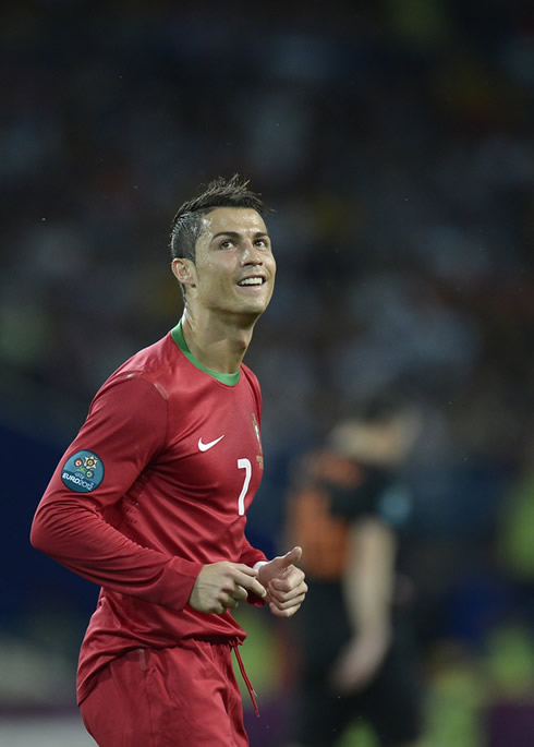 Cristiano Ronaldo smiling again in a Portugal game for the EURO 2012