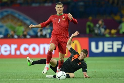 Cristiano Ronaldo getting past Klaas Jan Huntelaar, in Portugal 2-1 Netherlands, at the EURO 2012