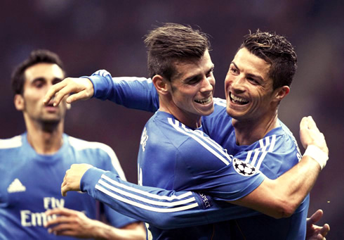Cristiano Ronaldo hugging Gareth Bale, in Real Madrid goal celebrations, in the Champions League 2013-2014