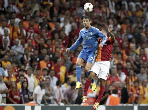 Cristiano Ronaldo jumping above a defender, in Galatasaray vs Real Madrid