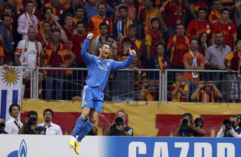 Real Madrid turns his back to the Turkish Galatasaray fans and jumps to celebrate his hat-trick and Real Madrid goal