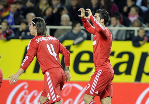 Cristiano Ronaldo dedicating the goal to his son, with Sergio Ramos near him