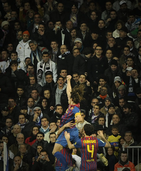 
Carles Puyol equalizer goal celebration in Real Madrid vs Barcelona with Cesc Fabregas behind him, at the Santiago Bernabéu, in the Copa del Rey 2011-2012