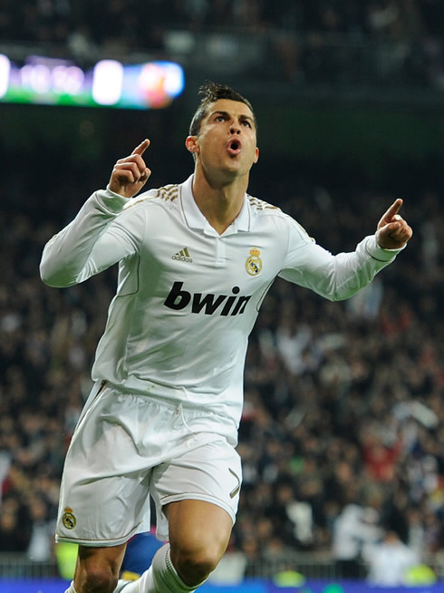 Cristiano Ronaldo looking at the someone in the Santiago Bernabéu crowd when running to celebrate his goal against Barcelona, in 2011/12