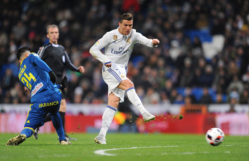 Cristiano Ronaldo strikes with his right foot