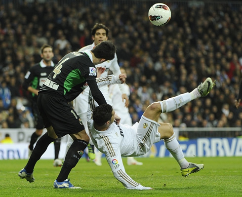 Cristiano Ronaldo trying to make an overhead kick while being on the ground
