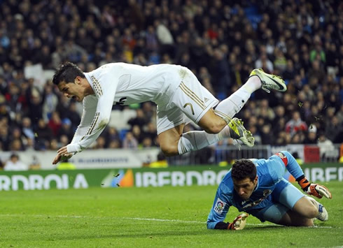 Cristiano Ronaldo flying over Racing Santander goalkeeper in La Liga 2012