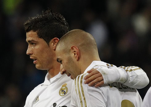 Cristiano Ronaldo with his arm over Karim Benzema, in Real Madrid 2012