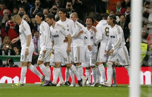 Real Madrid players celebrating the first goal of the night around Cristiano Ronaldo, in La Liga 2012