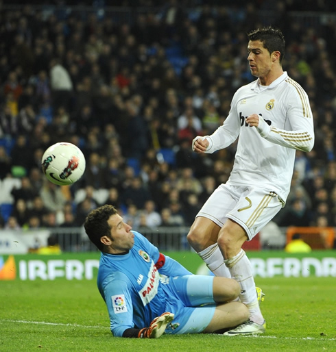 Cristiano Ronaldo colliding with Racing Santander goalkeeper in La Liga 2012