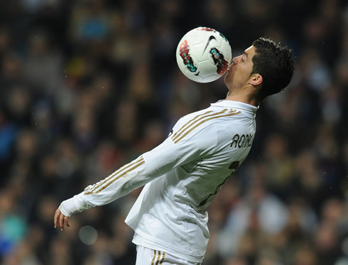 Cristiano Ronaldo kissing the ball in Real Madrid vs Racing Santander, for La Liga in 2012