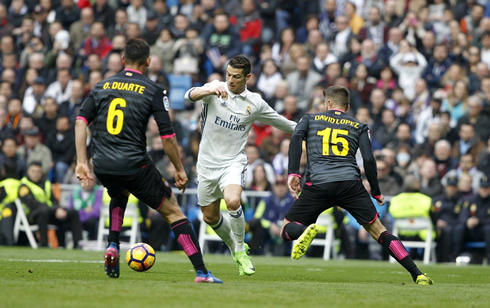 Cristiano Ronaldo trying to dribble two opponents at once in Real Madrid vs Espanyol