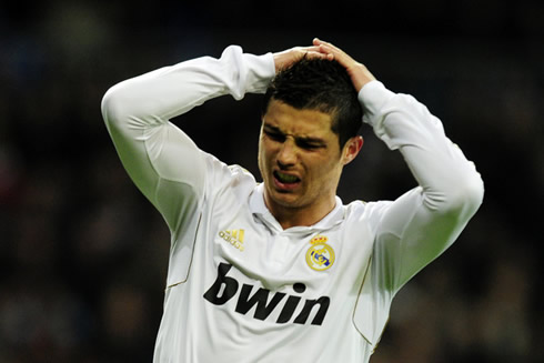 Cristiano Ronaldo putting his hands on his head, shocked by the 1-1 draw in Real Madrid vs Malaga for La Liga in 2012