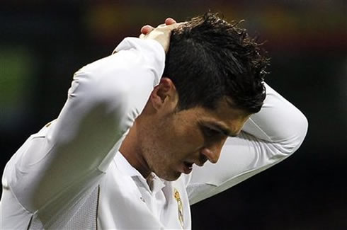 Cristiano Ronaldo looking down and thinking what went wrong against Malaga
