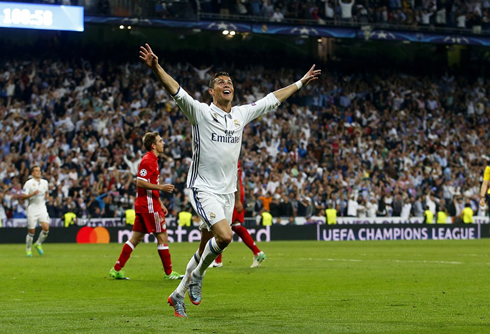 Cristiano Ronaldo throws his arms in the air as he celebrates his hat-trick in Real Madrid 4-2 Bayern Munich in 2017