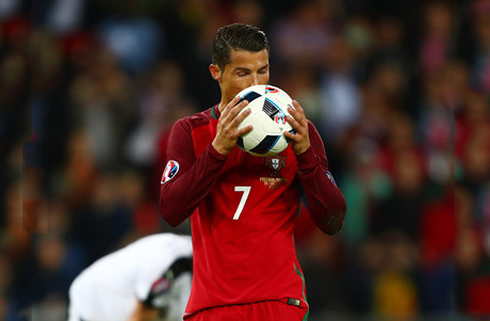 Cristiano Ronaldo kissing the football before taking the penalty-kick in Portugal 0-0 Austria in the EURO 2016