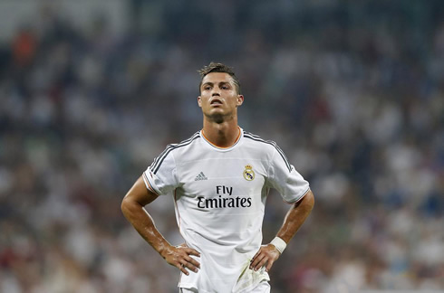 Cristiano Ronaldo looking exhausted as he puts his hands on his waist