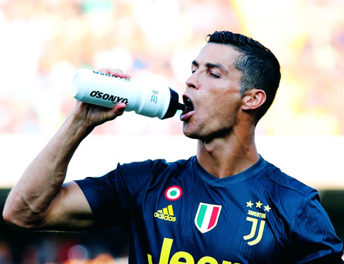 Cristiano Ronaldo drinking from a bottle in his first game for Juventus