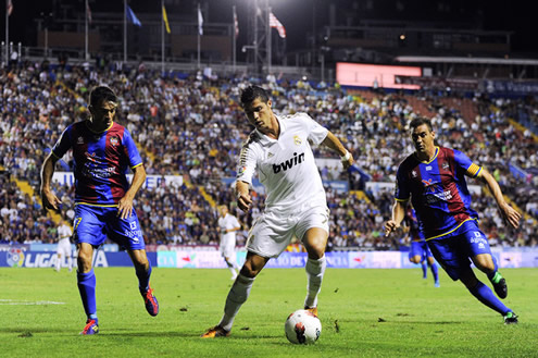 Cristiano Ronaldo showing his technique skills protecting the ball in La Liga 2011-12, in the match between Levante and Real Madrid