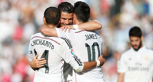 
Cristiano Ronaldo group hug with Chicharito and James Rodríguez