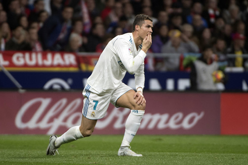 Cristiano Ronaldo puts his hand on his teeth