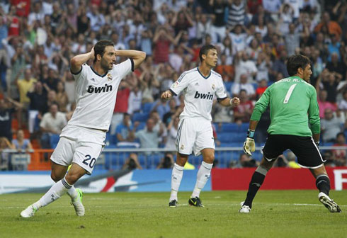 Cristiano Ronaldo and Gonzalo Higuaín disbelief after Real Madrid misses a chance to score against Valencia, in La Liga 2012-2013