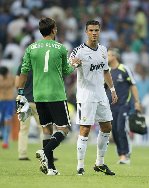 Cristiano Ronaldo greeting Valencia goalkeeper, Diego Alves, after Real Madrid's debut in La Liga 2012-2013