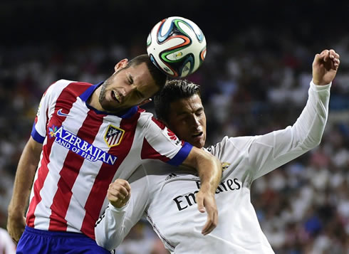 Cristiano Ronaldo clashing heads with an opponent, in Real Madrid 1-1 Atletico Madrid