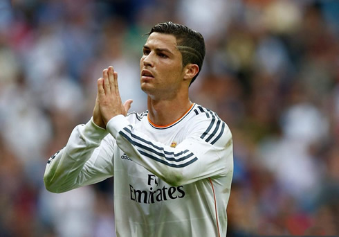 Cristiano Ronaldo praying during a game for Real Madrid