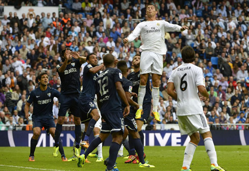 Cristiano Ronaldo rises in the air above everyone else, in Real Madrid 2-0 Malaga