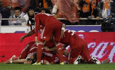 Real Madrid players pilling up in goal celebrations against Valencia, in Mestalla