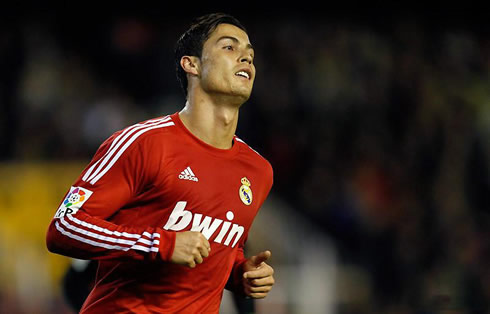 Cristiano Ronaldo in a Real Madrid red jersey/shirt/kit, for the Spanish League 'La Liga' 2011-2012