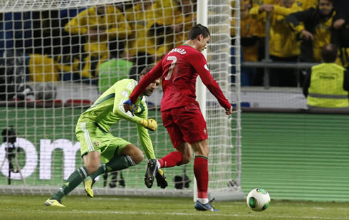 Cristiano Ronaldo going around Isaksson to score his hat-trick for Portugal