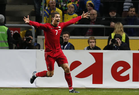Cristiano Ronaldo running around in complete ecstasy, after scoring for Portugal and taking his country to the 2014 FIFA World Cup in Brazil