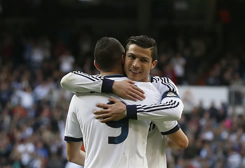 Cristiano Ronaldo hugging Benzema, after the Frenchman buries another goal for Real Madrid against Betis, in the Spanish League 2012-2013