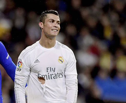 Cristiano Ronaldo gets his shirt ripped off during a game for Real Madrid in 2016