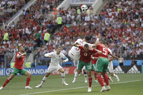 Cristiano Ronaldo scores from a header in Portugal 1-0 Morocco in 2018