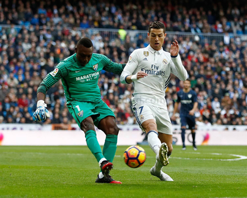 Cristiano Ronaldo trying to block a goalkeeper pass