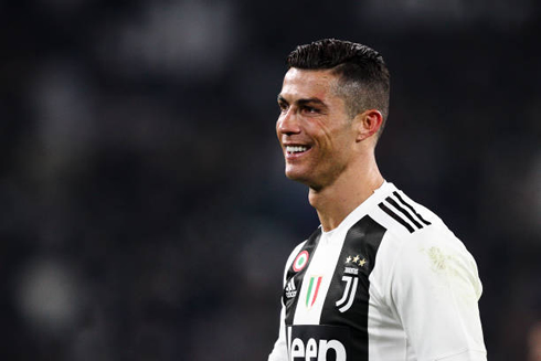 Cristiano Ronaldo smiling in a game between Juventus and Chievo Verona