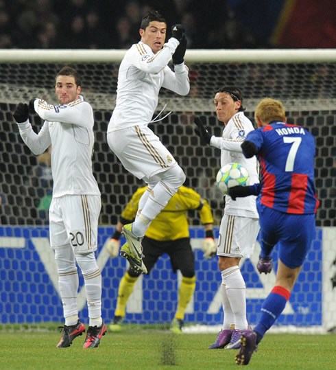 Cristiano Ronaldo jumping while being on the free-kick wall and attempting to block CSKA's Honda powerful shot