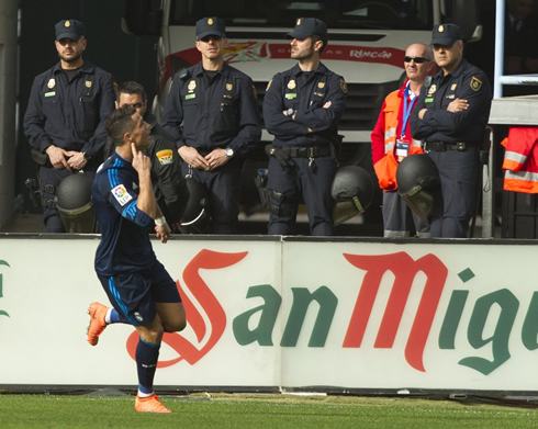 Cristiano Ronaldo teases the crowd in La Roseleda stands, after scoring Real Madrid's first goal against Malaga