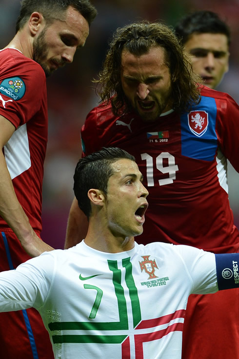 Cristiano Ronaldo being intimidated by two Czech Republic players, in the EURO 2012
