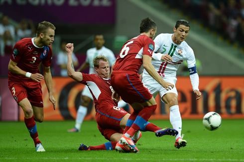 Cristiano Ronaldo suffering a foul near the Czech Republic penalty area, at the EURO 2012