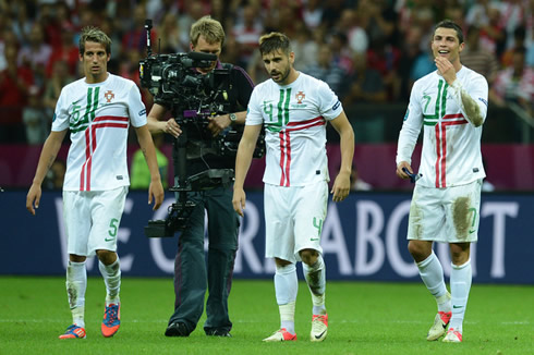 Fábio Coentrão, Miguel Veloso and Cristiano Ronaldo walking off the pitch, after beating Czech Republic by 1-0 and assuring the passage to the EURO 2012 semi-finals